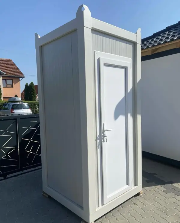 White flushing restroom cabin seen from the front